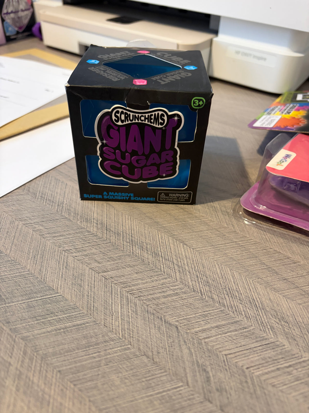 Scrunchems Giant Sugar Cube Squishy Squeeze Toy Purple/Blue/Pink/Black 3+